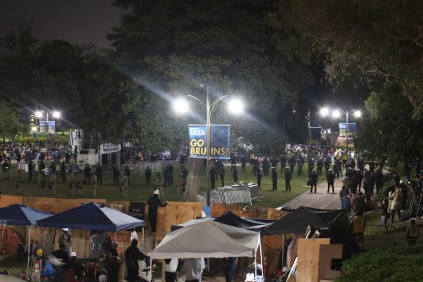 Law enforcement begins to set up for their raid on the student encampment